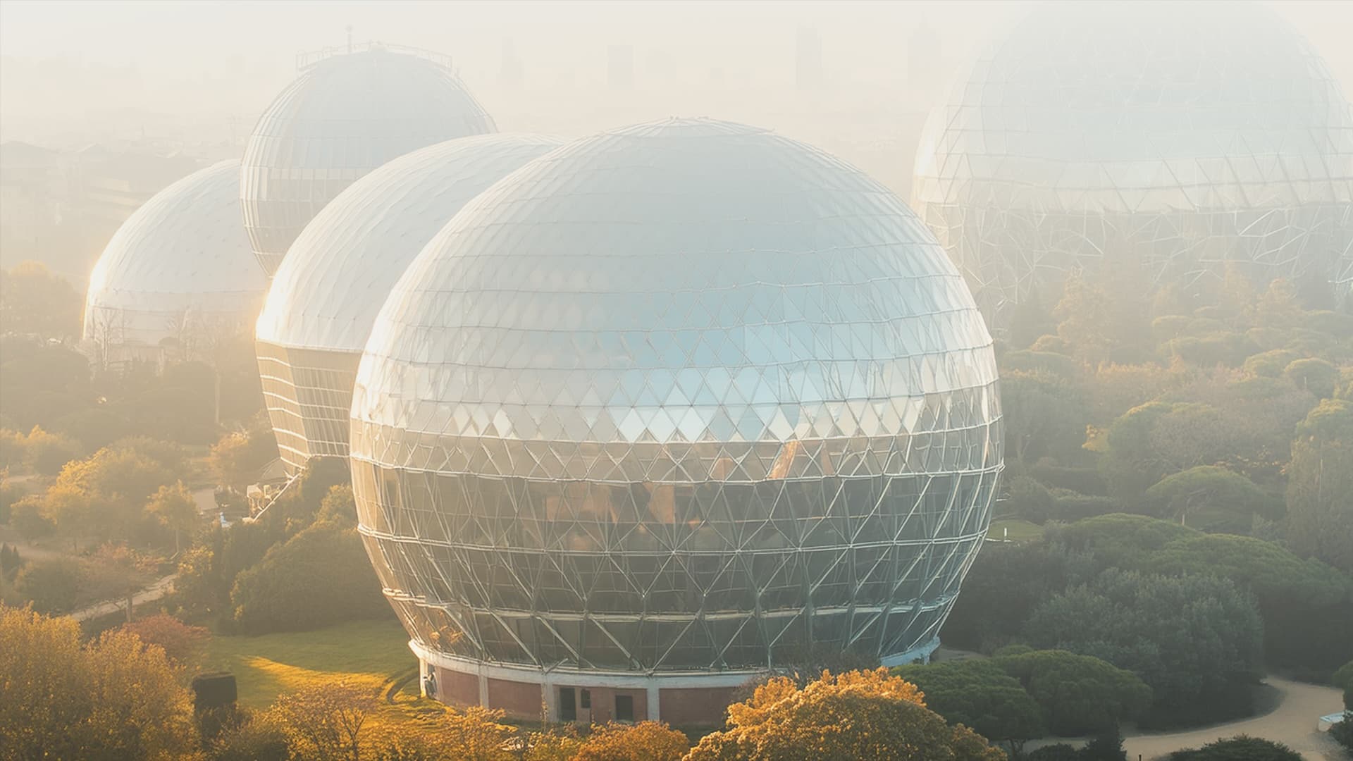 Image of futuristic geodesic observatory domes during daytime.